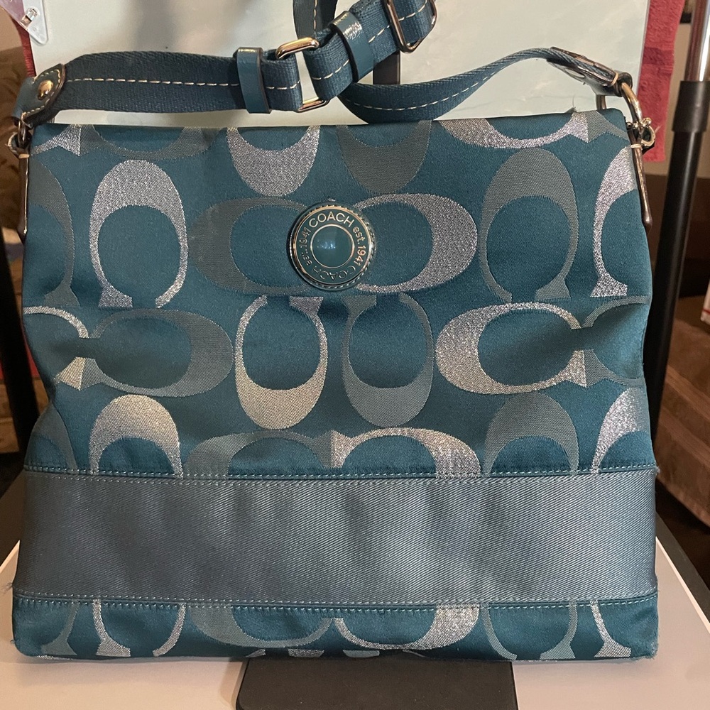 Stylish Blue Designer Women's Bag
Coach crossbody more green than blue.